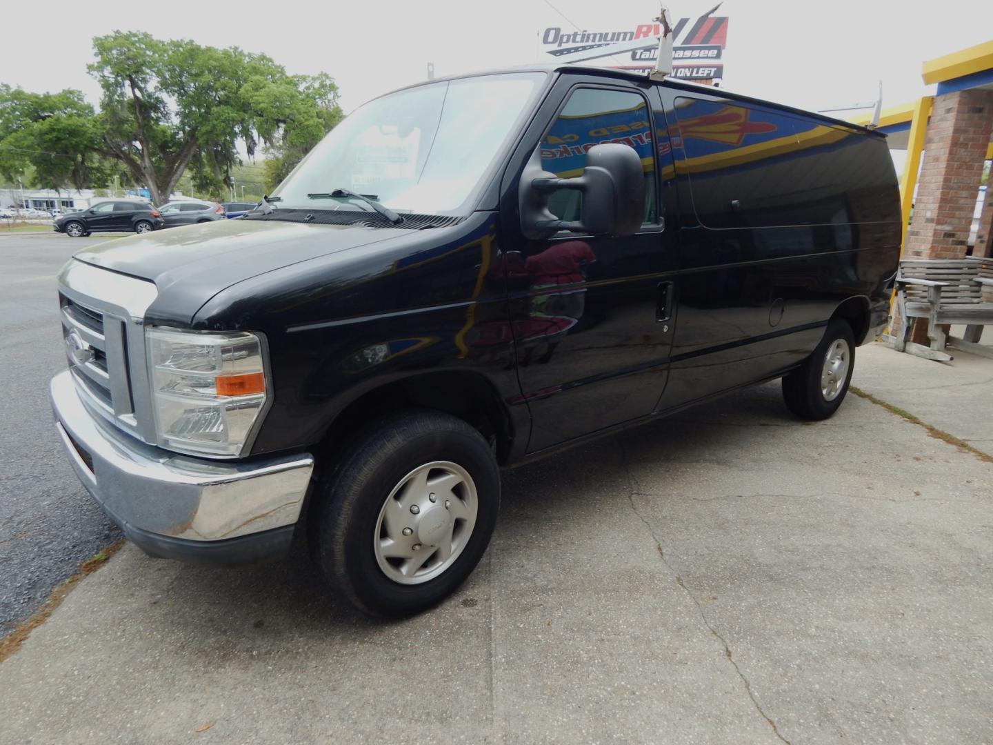 2014 Black Ford E-Series Van (1FTNE1EW6ED) with an V8 engine, Automatic transmission, located at 3120 W Tennessee St, Tallahassee, FL, 32304-1002, (850) 575-6702, 30.458841, -84.349648 - Used Car Supermarket is proud to present you with this loaded immaculate 2014 Ford E150 Econoline Work Van. Used Car Supermarket prides itself in offering you the finest pre-owned vehicle in Tallahassee. Used Car Supermarket has been locally family owned and operated for over 48 years. Our E150 Work - Photo#0